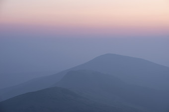 黎明山峰山丘摄影图