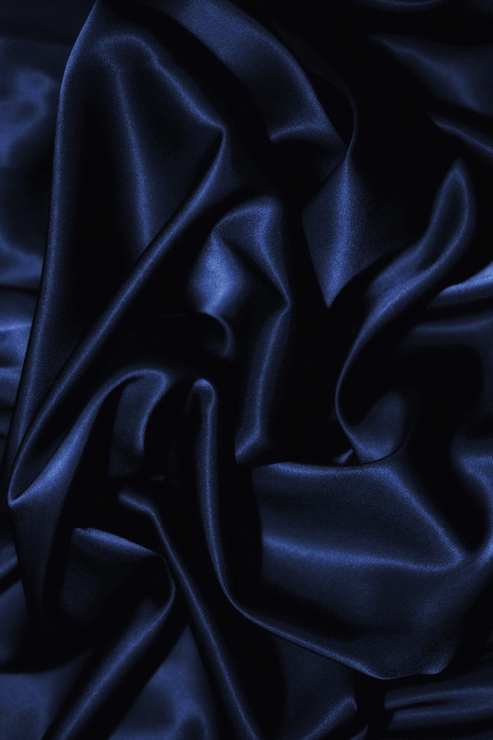 黑蓝丝绸褶皱绸缎背景