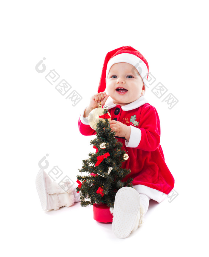 装饰圣诞树的小婴儿
