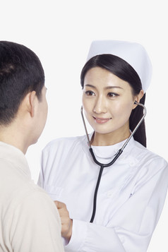 医疗保健人员护士听诊听诊器工作微笑