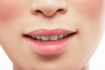 微笑的女人嘴巴摄影图
