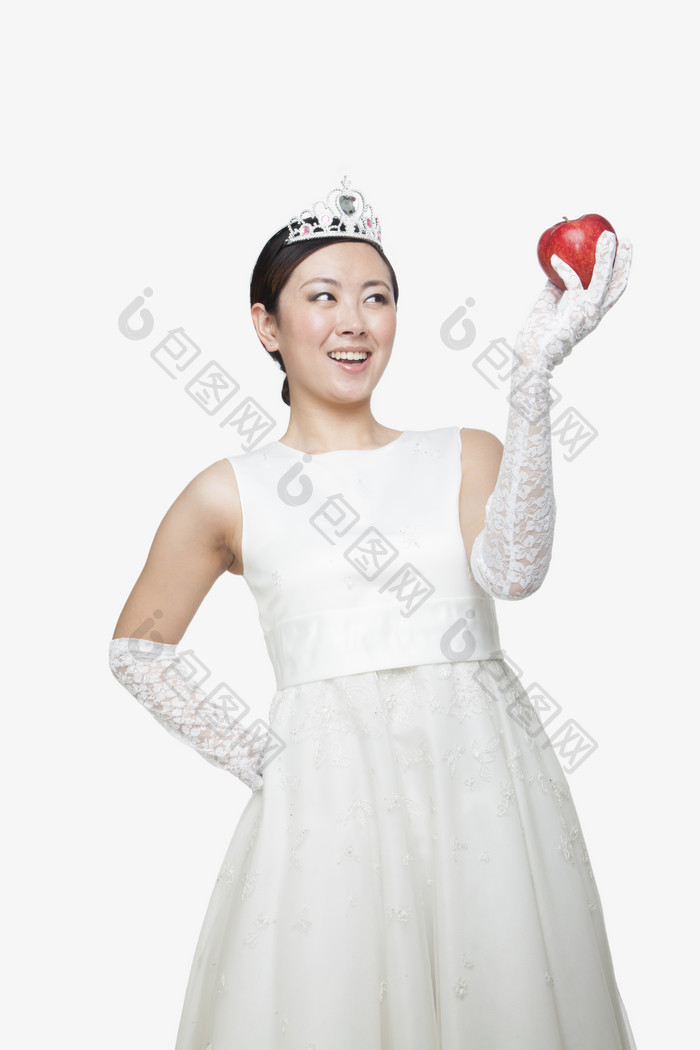 白色的婚纱礼服结婚新娘拿着苹果开心幸福