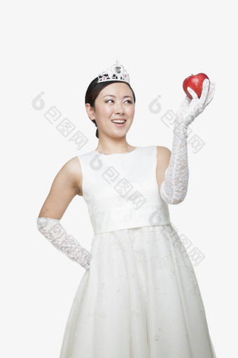 白色的婚纱礼服结婚新娘拿着苹果开心幸福
