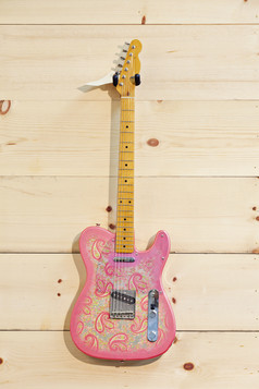 粉色乐器吉他摄影图