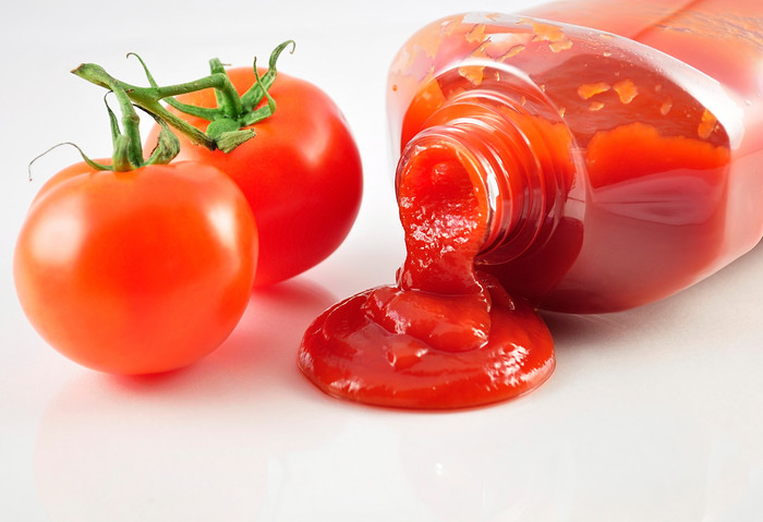 简约风格番茄汁摄影图