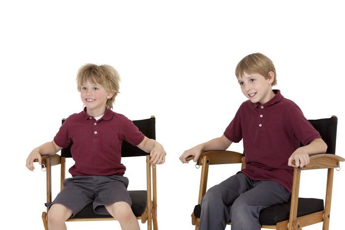 坐在椅子上的学生儿童