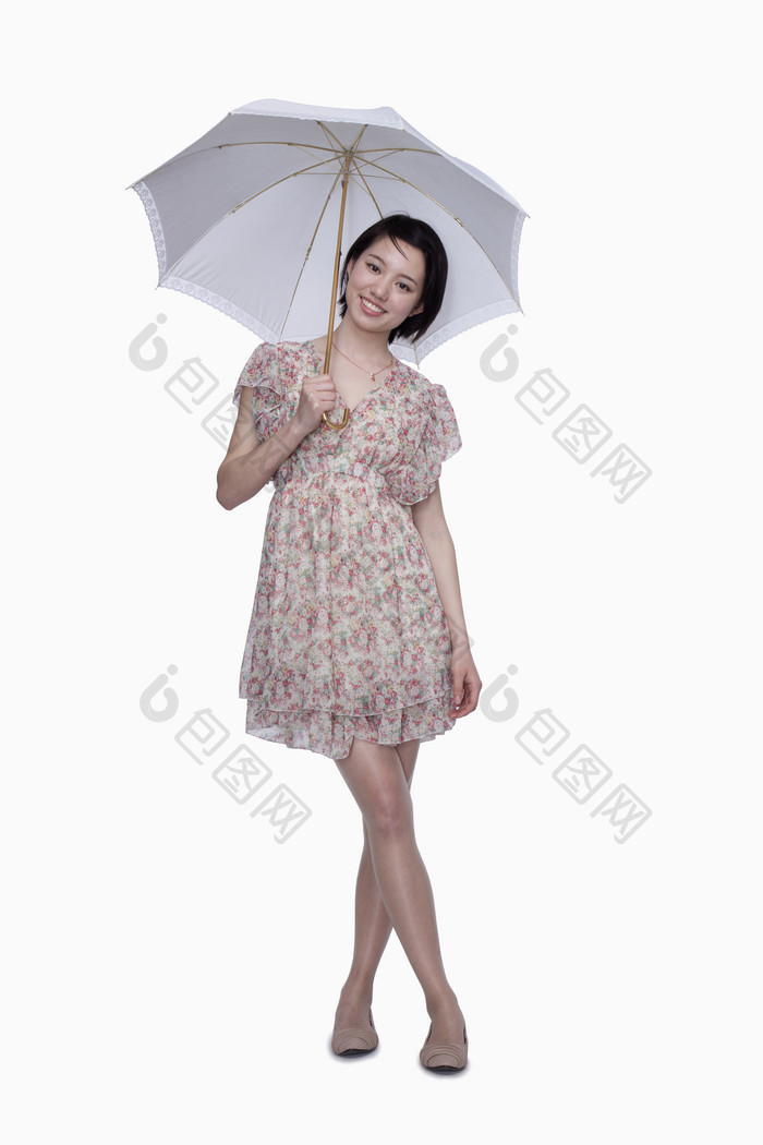 夏天撑伞遮阳防晒花裙子女人成熟的微笑牙齿