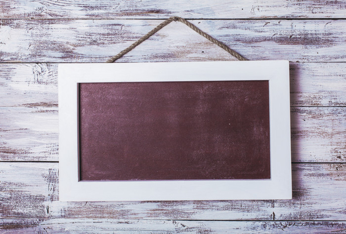 木板上白框黑板摄影图