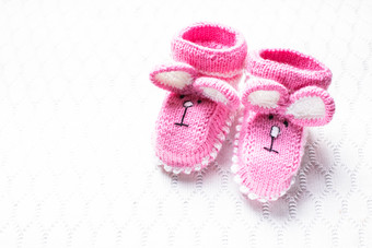 婴儿粉色可爱鞋子摄影图