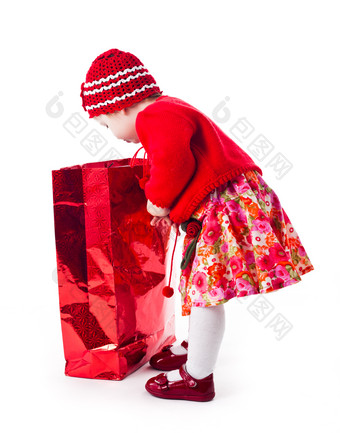 红色调找礼物的小女孩摄影图