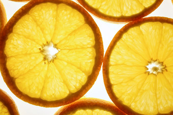 简约切开的橘子摄影图