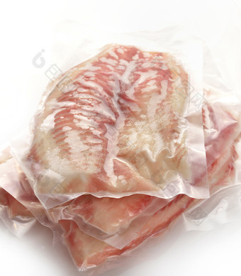 暖色调袋装的肉摄影图
