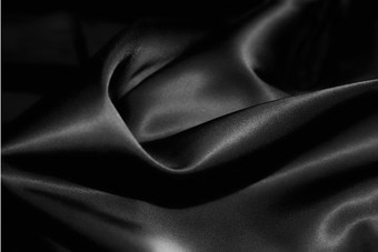 黑色调柔顺的丝绸摄影图