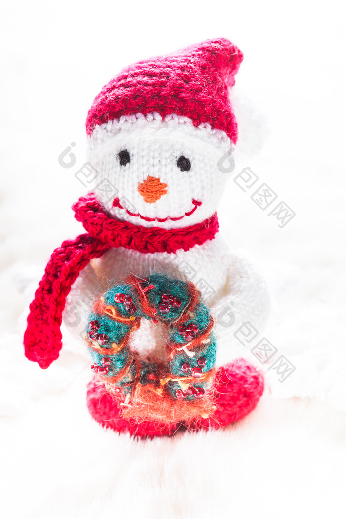 针织雪人装饰品摄影图