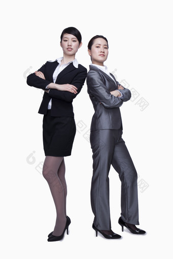 两个女人背靠背西装商业业务成熟的工作<strong>站着</strong>