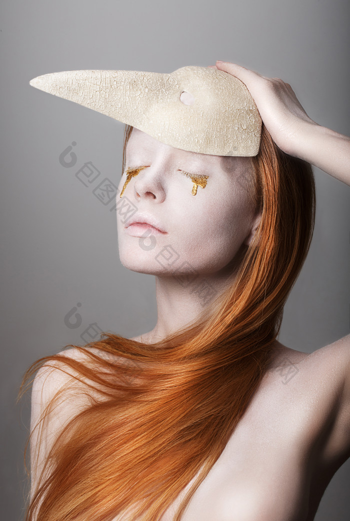 假面具面罩头饰女人图片摄影图