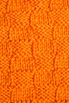 橙色针织毛衣摄影图