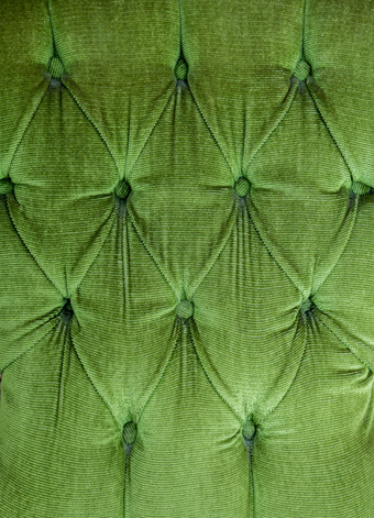 绿色沙发背纹理背景