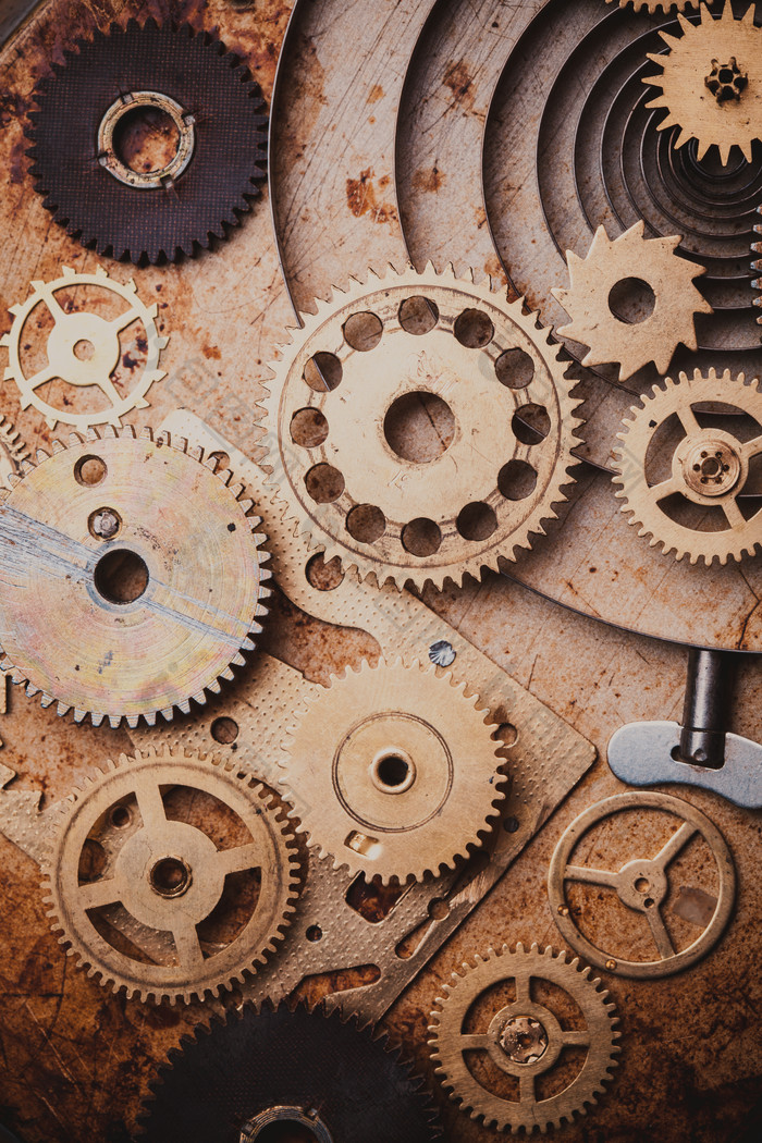 简约风钟表的齿轮摄影图
