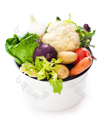 白色锅里的蔬菜摄影图