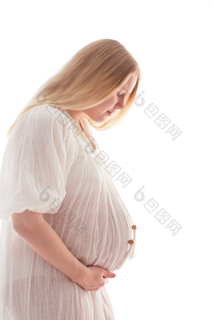 美丽的孕妇抚摸孕肚