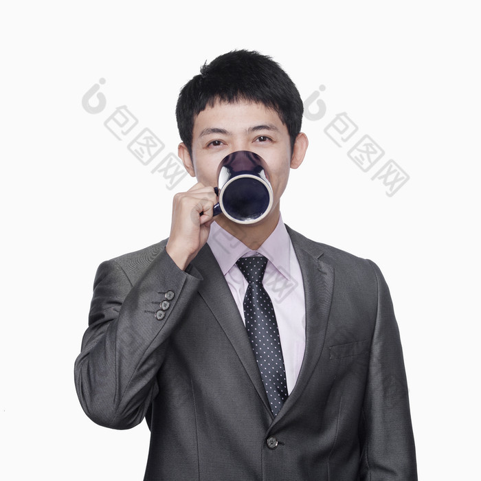 商务男人喝咖啡摄影图