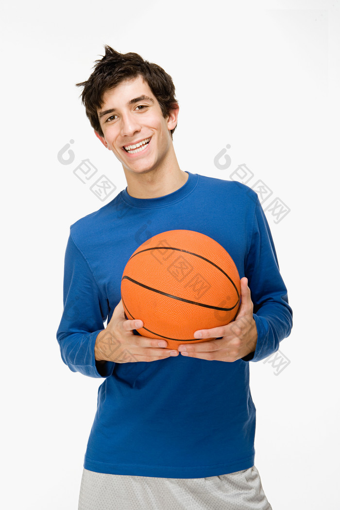 简约打篮球的男孩摄影图