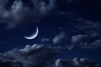 暗色调夜晚的月亮摄影图