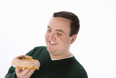 简约吃东西的胖男人摄影图
