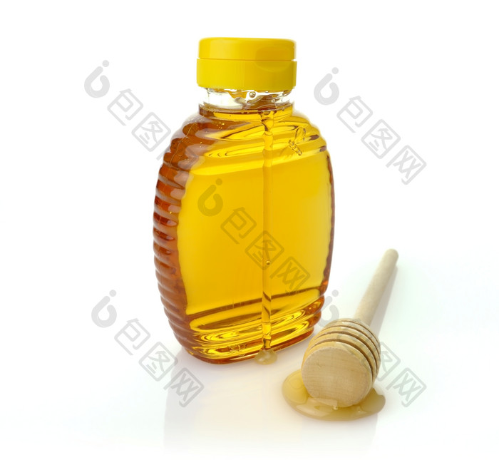 简约一瓶蜂蜜摄影图