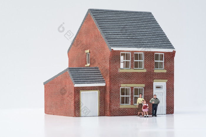 小人住房模型摄影图