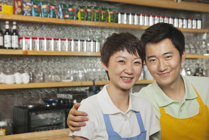 男人女人亲密的情侣夫妻老板咖啡店微笑摄影