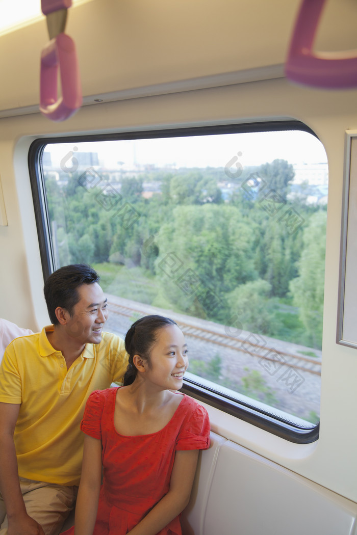 地铁车厢夫妻旅游度假户外男人女人摄影图