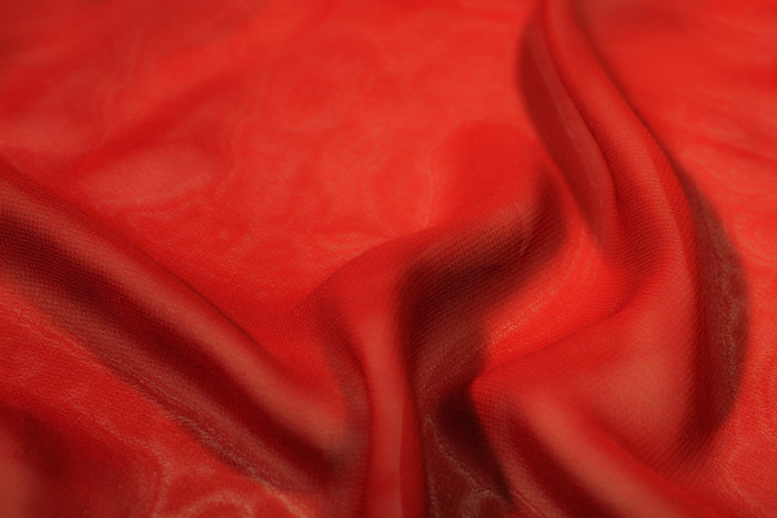红色调光滑绸子摄影图