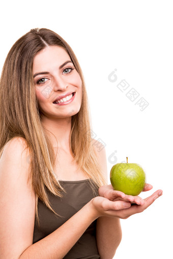 手持青苹果的女人