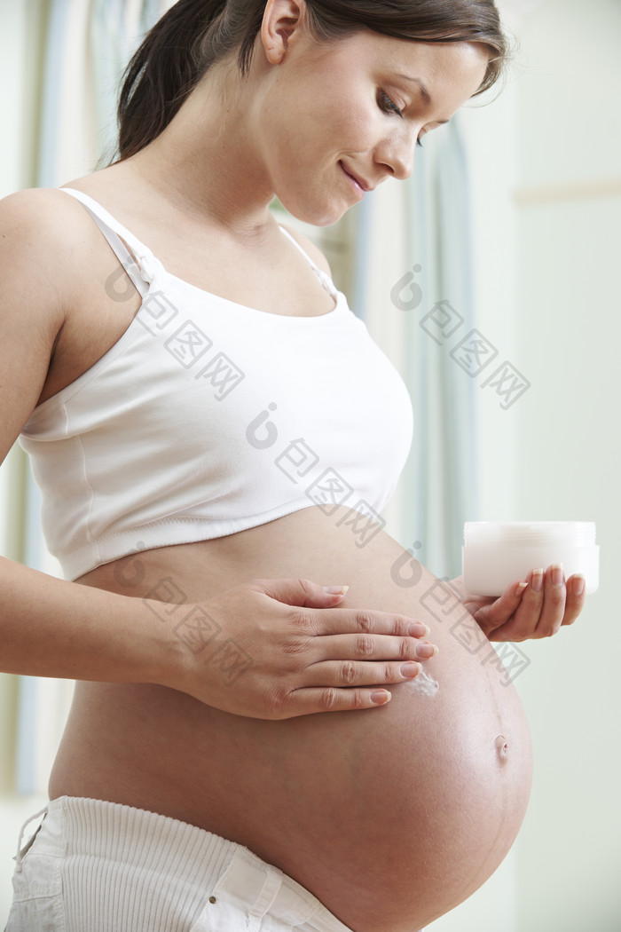 浅色调怀孕摄影图