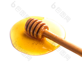 蜂蜜搅拌棒摄影图