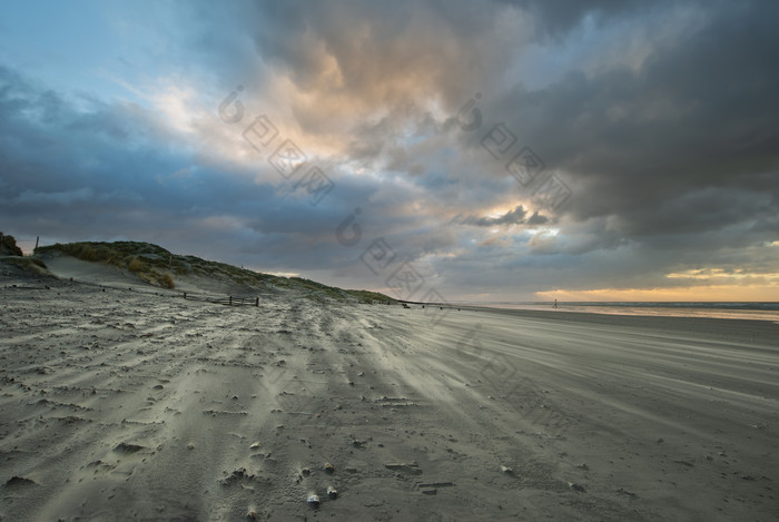 海边的沙滩沙子摄影图