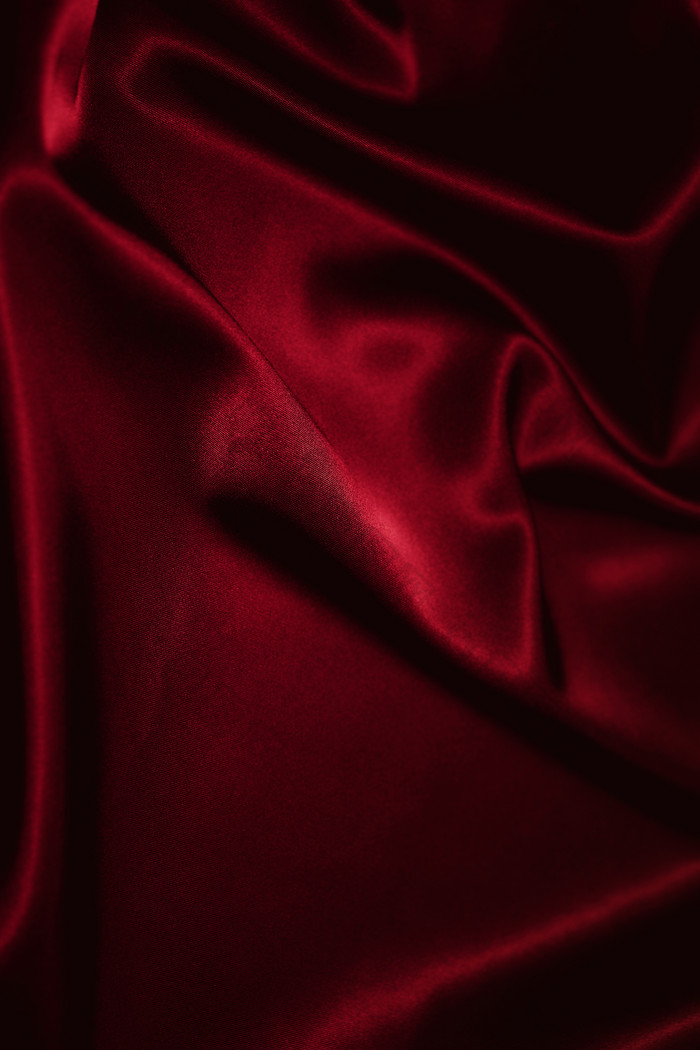 红色光滑调丝绸摄影图