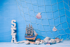 帆船船只和贝壳摄影图