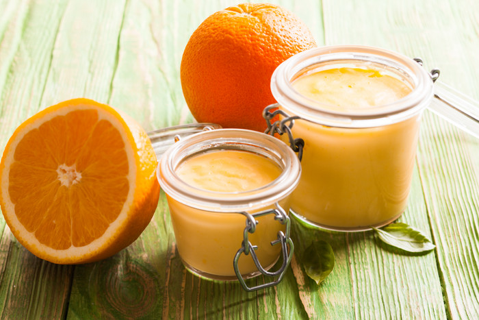 橙子布丁甜品摄影图