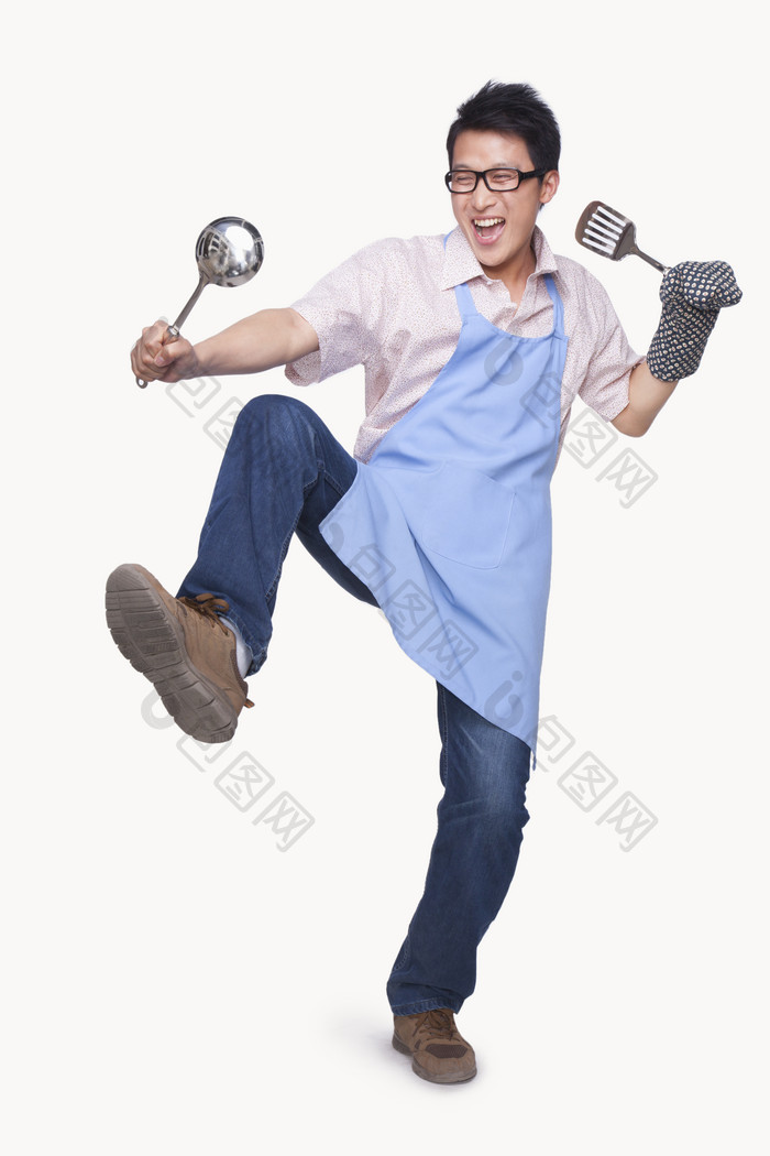 厨师做饭男人围裙有趣的铲子美食摄影图