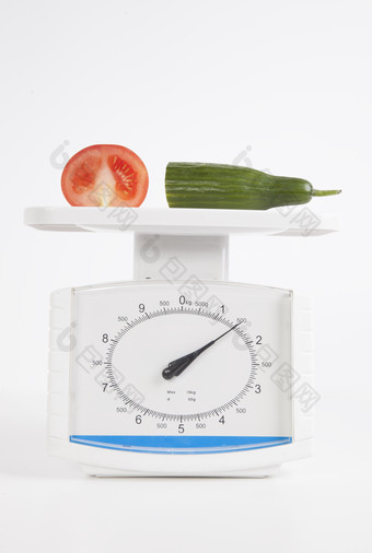 蔬菜和重量秤摄影图