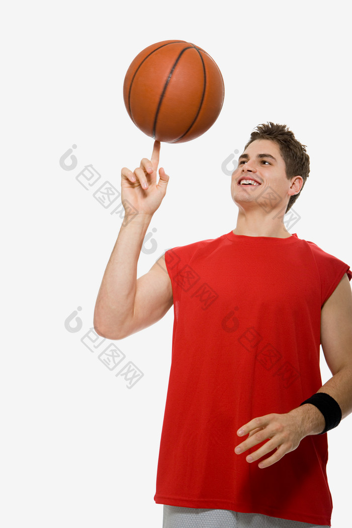 简约玩篮球的男子摄影图