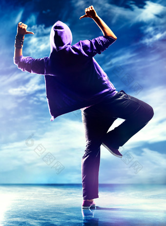 蓝色调一个舞动的人摄影图