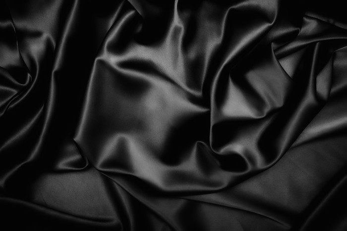 黑色调绸子摄影图