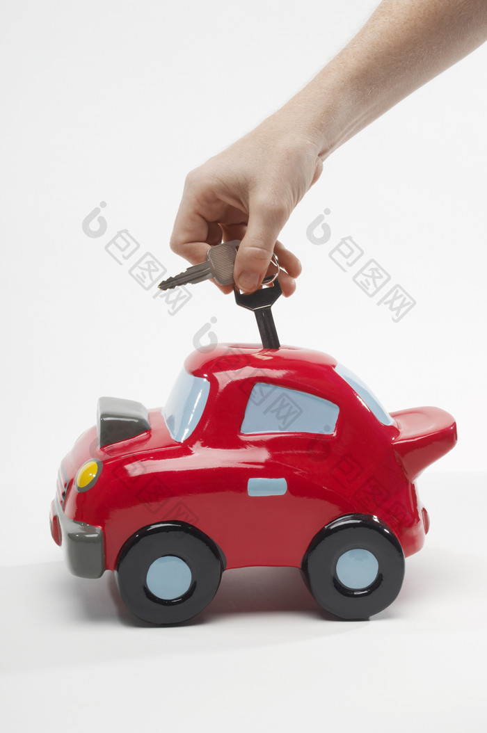 红色玩具小汽车摄影图