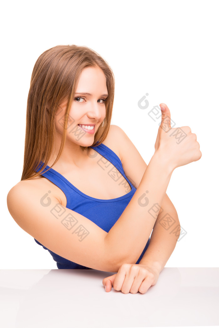 竖起大拇指的女生摄影图