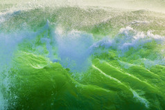 绿色海浪浪花摄影图