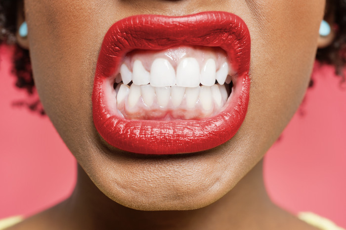 红唇人物牙齿摄影图